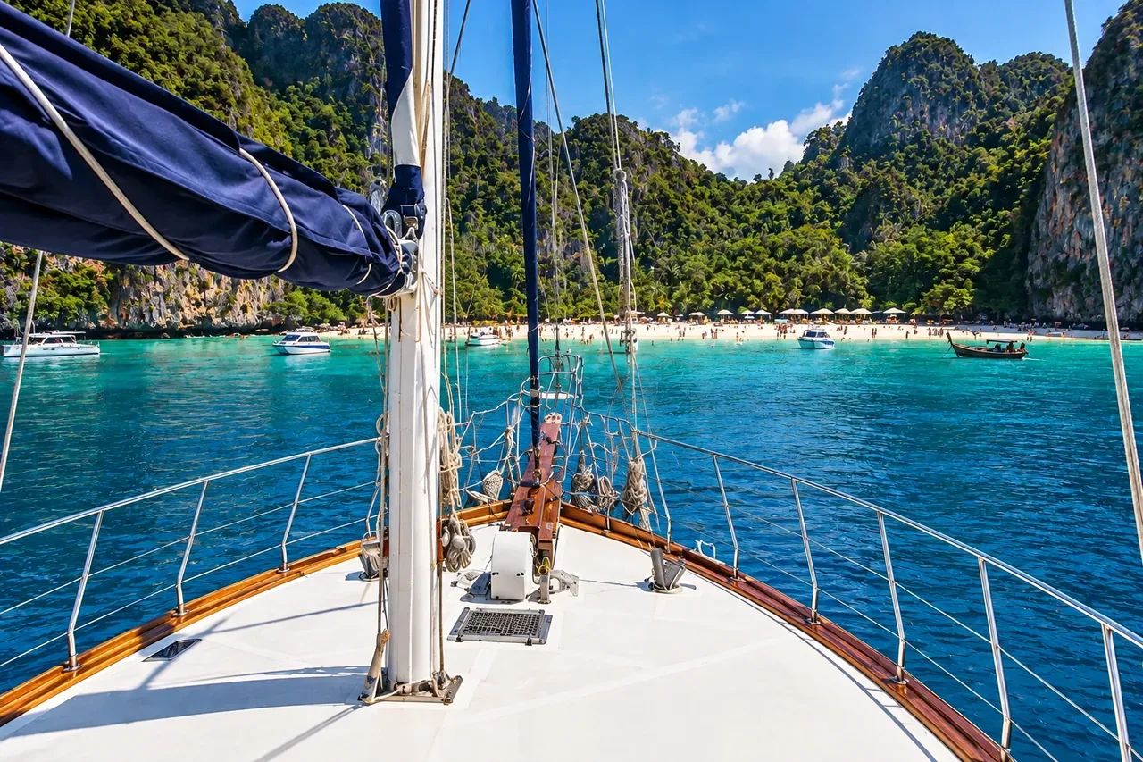 A busy beach seen from a quiet anchorage — AI-generated illustration