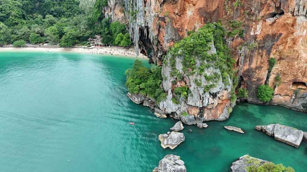 Andaman Sea coastline with green headlands and calm water